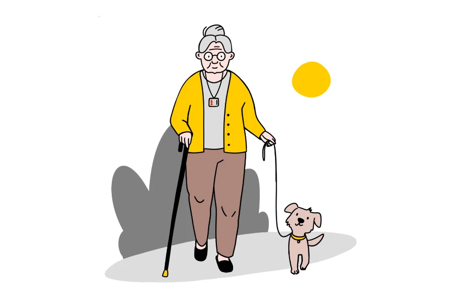 Seniorka s přívěskem SOS venčí psa